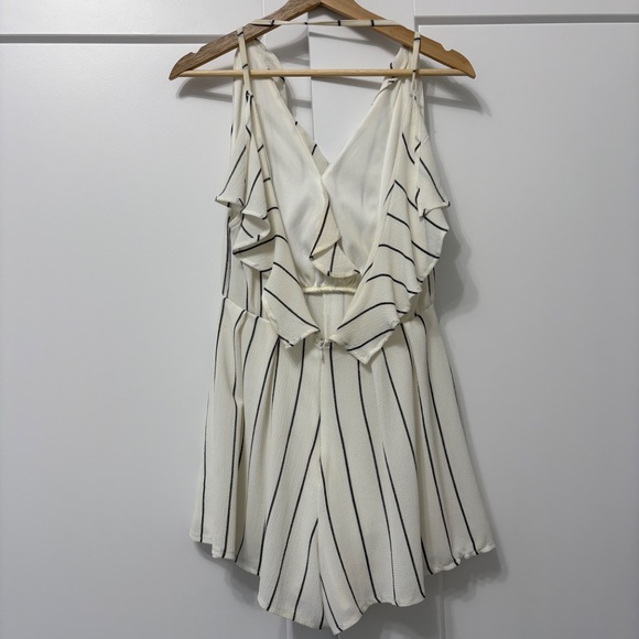 Striped open back ruffled romper - Picture 2 of 7